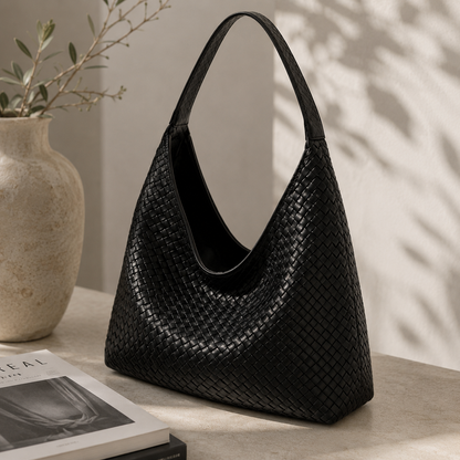 Bolso negro trenzado